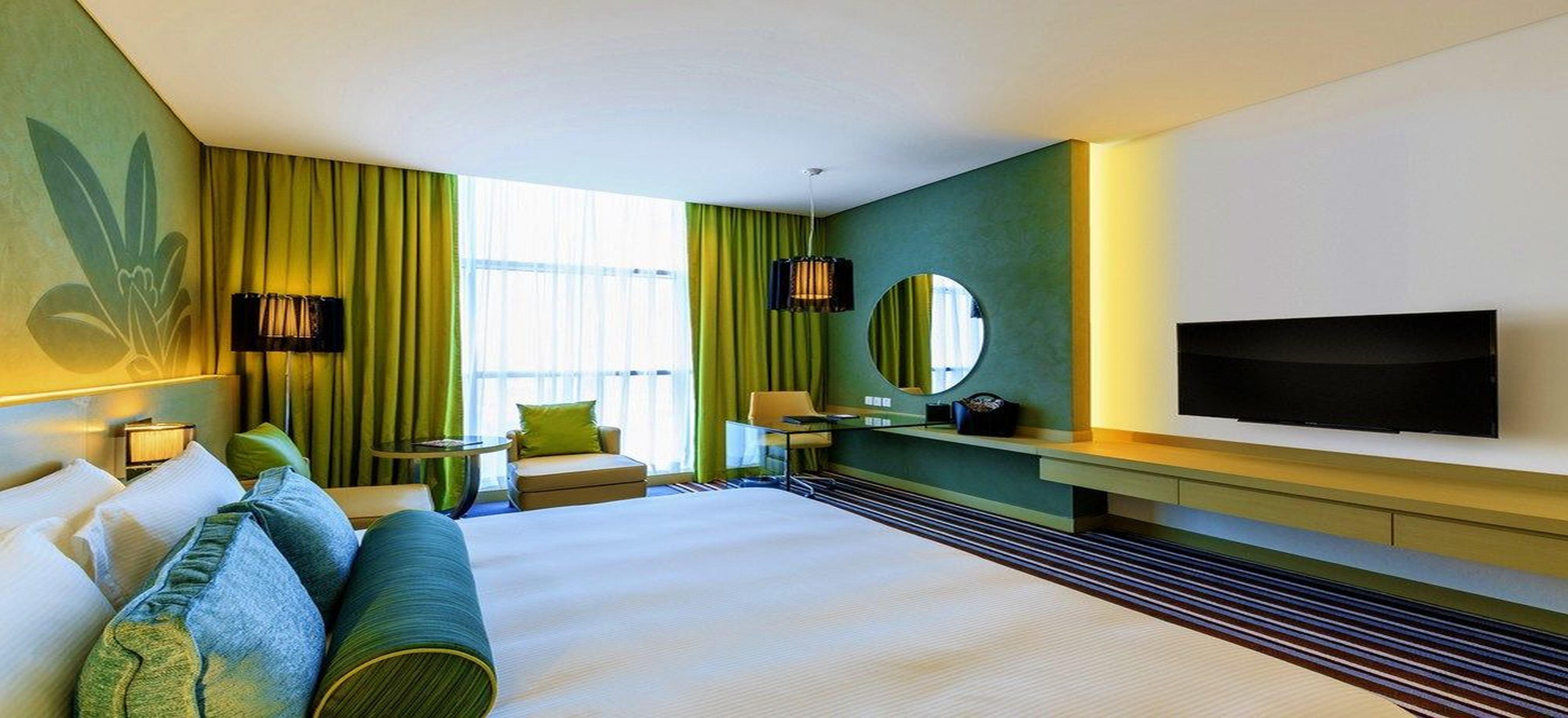 Downtown Rotana Hotel Manama Luaran gambar A room at the hotel