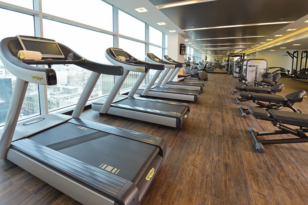 Downtown Rotana Hotel Manama Luaran gambar A row of treadmills