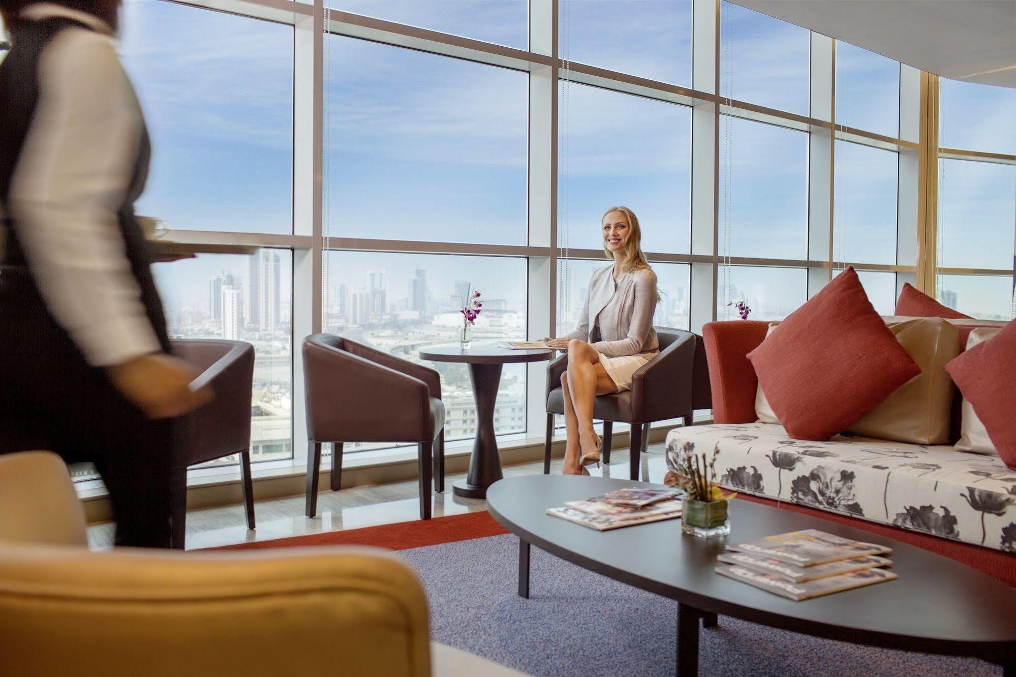 Downtown Rotana Hotel Manama Luaran gambar A lounge at the airport